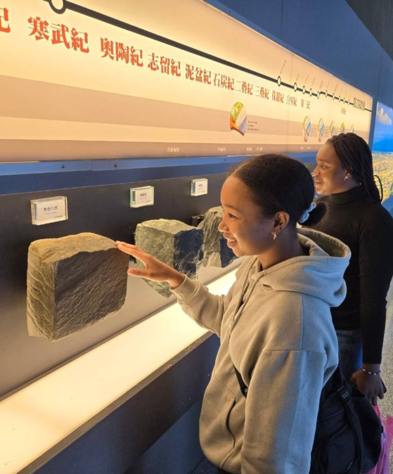 Austrian student Daniel Gombos and Mongolian student Oyundalai Odkhuu explored the plant section of the museum, while American student Christina Ellis (left) and Nigerian student Kei Motimifagha visit