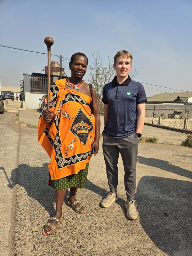 Antoni Mazek with a local resident.