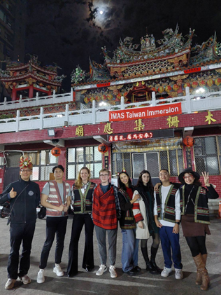 Professors and IMAS students immerse themselves in Taiwanese culture by wearing indigenous clothing.