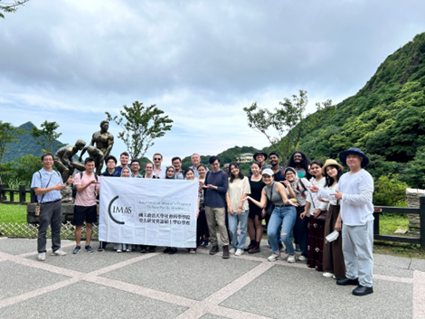 IMAS students and Summer School participants in front of the Gold Miner Statue.