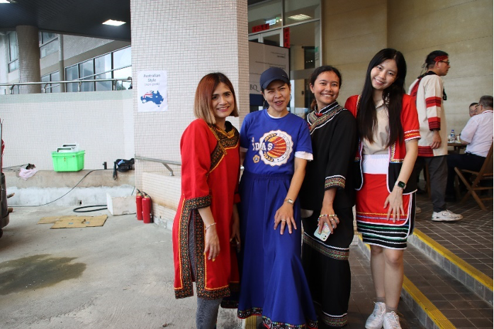 IMAS students from Thaliand pose for a picture while wearing indigenous Taiwanese dress.