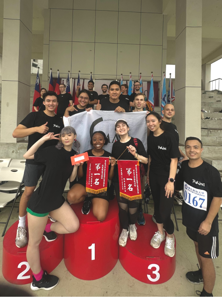 IMAS Students celebrating having won two team championships.